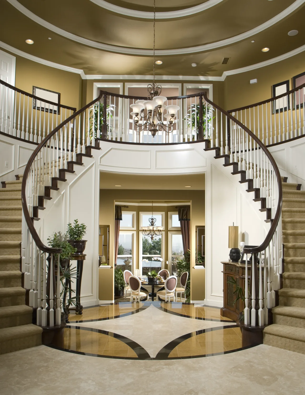 Curved staircase in a spacious home entrance